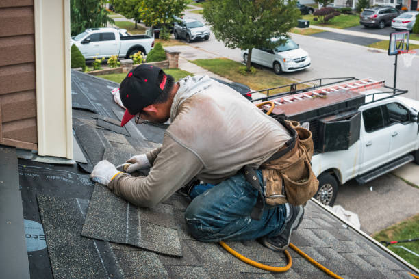 Professional Emergency Roof Repair technician working in Clarkrange, TN